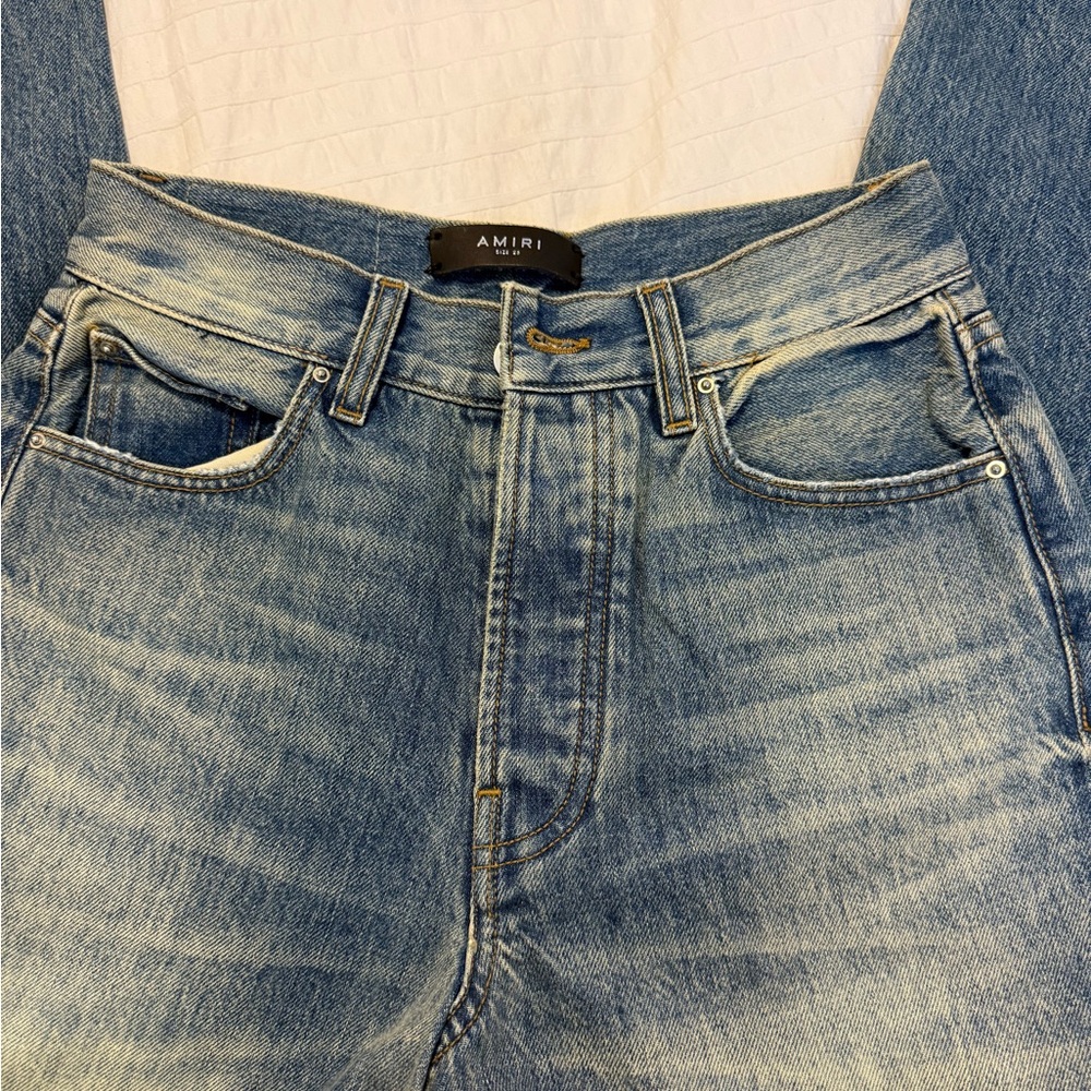 AMIRI Blue Skinny Jeans with Vintage Distressing